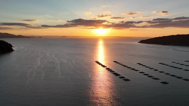 Hikizu Bay, Itoshima, Fukuoka, Japan Coastline in Autumn: 4K Aerial Drone Footage of Rural Beach at sunset, Islands, Calm Ocean, Mountain Silhouettes and Scenic Coastal Landscape
