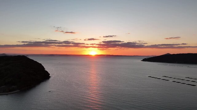 Hikizu Bay, Itoshima, Fukuoka, Japan Coastline in Autumn: 4K Aerial Drone Footage of Rural Beach at sunset, Islands, Calm Ocean, Mountain Silhouettes and Scenic Coastal Landscape