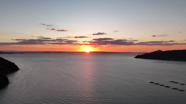 Hikizu Bay, Itoshima, Fukuoka, Japan Coastline in Autumn: 4K Aerial Drone Footage of Rural Beach at sunset, Islands, Calm Ocean, Mountain Silhouettes and Scenic Coastal Landscape