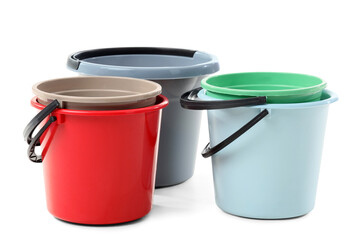 Plastic buckets on white background
