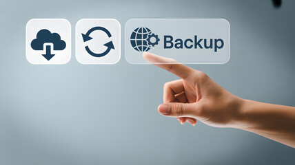 Fototapeta premium Hand clicking backup button for data protection and security online