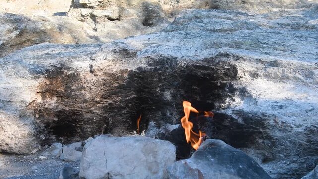 Antalya, &Ccedil;ıralı: Yanartaş (Chimera) in Olympos National Park. A natural methane gas flame that emerges from the rocky slope without extinguishing. A legendary and geological natural beauty.