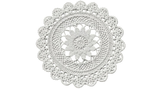 White Crochet Doily With Intricate Floral Pattern On Black Background