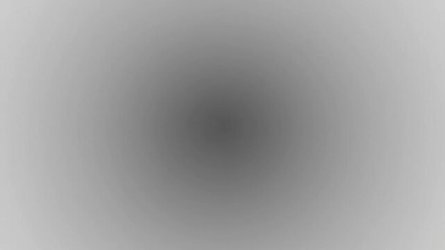 Abstract Light Burst and Fading Effect on Black and White Backgrounds.
