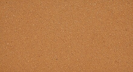 Natural cork texture with a warm brown granular surface provides an abstract background for design and decor, captured in a full frame view.