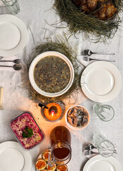Traditional christmas eve dinner table with various food