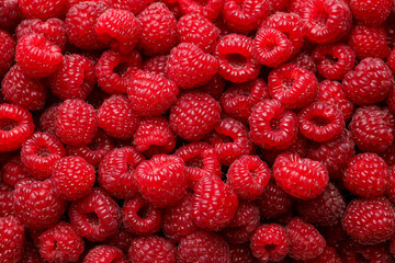Fresh ripe raspberries as background, top view
