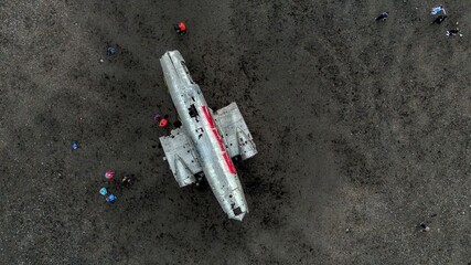 Aerial view of Wreckage of DC plane on black sand beach in Iceland a popular tourist