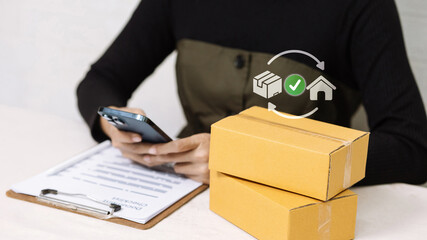 Online seller checking smartphone with parcel boxes and home delivery icons.