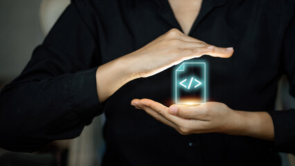 Woman hands protecting virtual file icon with programming code brackets symbol.