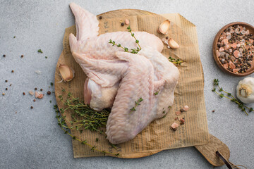 Spiced Turkey Wings on Wooden Board