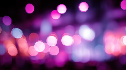 Fototapeta premium A vibrant, blurred composition featuring colorful bokeh lights in shades of pink and purple, creating a dreamy, festive atmosphere.