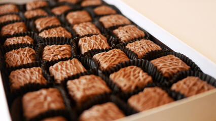 Chocolates Spinning in Luxury Box over White 2