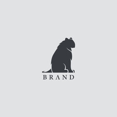 Minimalist lion silhouette logo in black and white style. Modern and elegant logo suitable for pet brand, wildlife business, outdoor brand, fashion, creative studio, or premium brand identity
