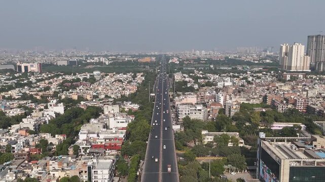 Drone footage highlighting Noida&rsquo;s organized layout with tree-lined expressways and tall towers reflecting smart urban development.