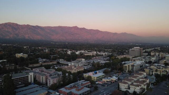 Aerial 4K, drone footage of the city of Pasadena in Southern California during a sunset. 
