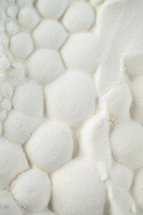 Glass Vial with Liquid Surrounded by Single Use Syringes