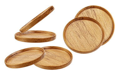 studio photograph of a collection of round wooden serving trays, showcasing their natural wood grain and different viewing angles against transparent background.