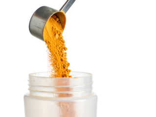 This image effectively conveys the meticulous process of dispensing a vibrant yellow ingredient, vital for enhancing flavor or providing health benefits in a mindful lifestyle