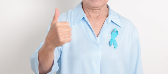 Elderly with blue Ribbon for Prostate Cancer Awareness month, April Child Abuse Prevention, National Bullying, September Addiction Recovery, May Chronic Fatigue Syndrome and January Human Trafficking