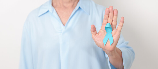 Elderly with blue Ribbon for Prostate Cancer Awareness month, April Child Abuse Prevention, National Bullying, September Addiction Recovery, May Chronic Fatigue Syndrome and January Human Trafficking