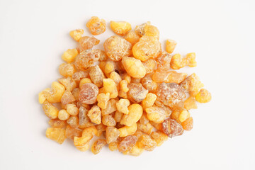 Frankincense or olibanum aromatic resin isolated on white background used in incense and perfumes.