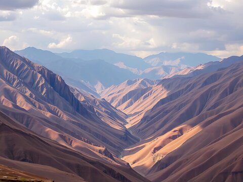 Alamut Valley's dramatic landscape with towering mountains and rolling hills, outdoor, hill