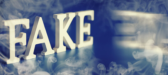 The concept of modern information technology. Fake and facts in the news. The letters spelled the...