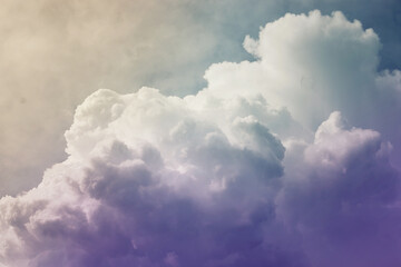 Beautiful sunset sky above clouds with dramatic light. Cabin view from airplane