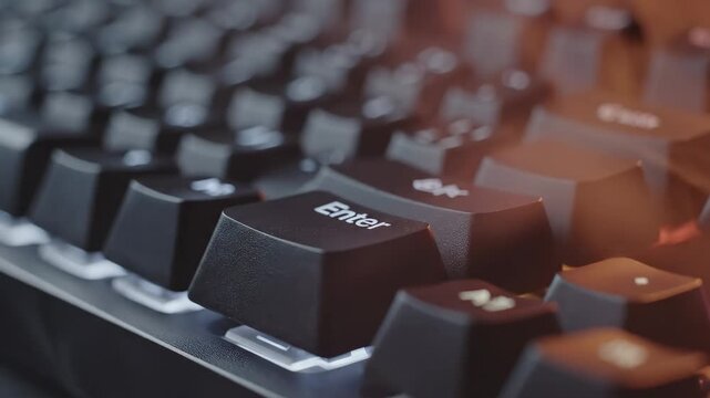 Close-Up of Computer Keyboard Enter Key - This video features a close-up view of a computer keyboard, focusing on the prominent "Enter" key.
