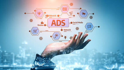 A creative representation of digital advertising showcases a hand emerging in front of a vibrant cityscape, symbolizing the future of online marketing and social media engagement. Tessel