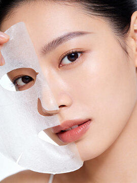 Beauty Portrait of Woman Wearing Transparent Sheet Mask korea