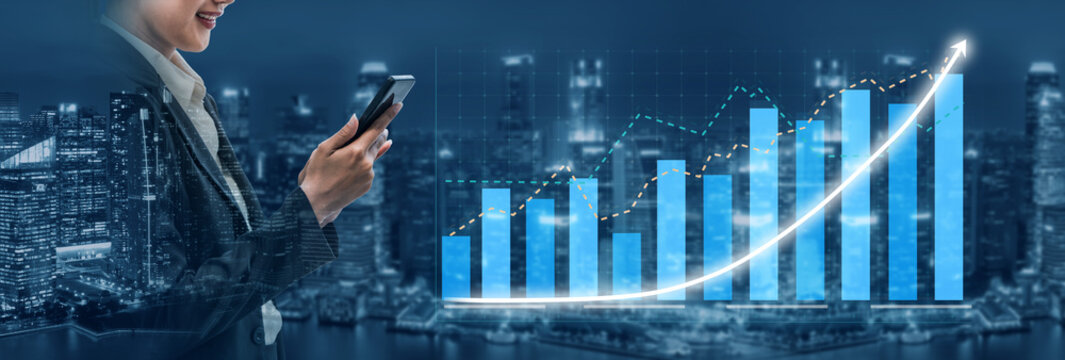 A professional woman in business attire uses a smartphone to analyze financial trends and growth. The urban skyline serves as a backdrop, highlighting modern business dynamics. Impute - Powered by Adobe