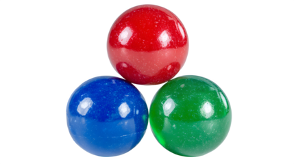 Three colorful glossy marbles red blue and green stacked in a pyramid shape against black