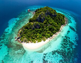 Aerial view of a lush green island surrounded by turquoise waters