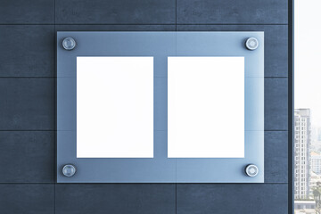 Fototapeta premium Blank vertical signage mockup with dual white poster frames on glass mount inside modern interior wall with city view through window. 3D Rendering