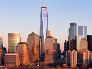 Obraz premium NYC aerial cityscape at dusk. New York City Hudson skyline at dusk. New York dusk metropolis. NYC panoramic view of Lower Manhattan skyline. New York City aerial skyline at dusk.