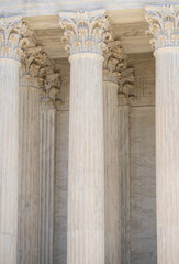 Obraz premium Monumental columns define classical architecture. Tall marble pillars shape historic architecture. White stone columns express civic architecture. Supreme Court columns suggest justice and authority.