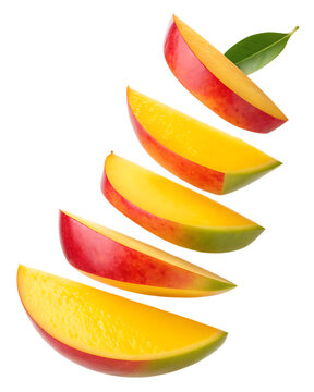 A dynamic display of falling mango slices showcasing vibrant colors against a dark background.