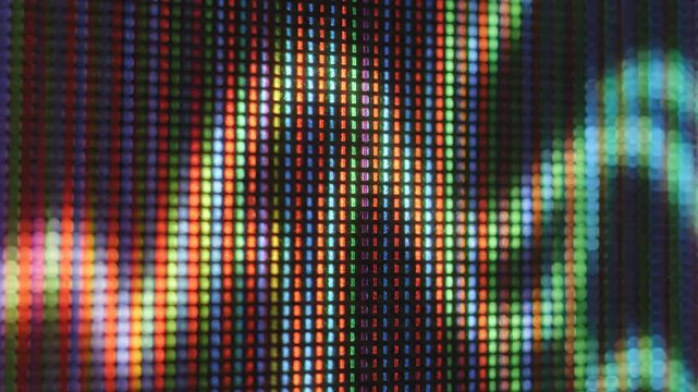 Vibrant Digital Waveforms Across Neon Data Screen.