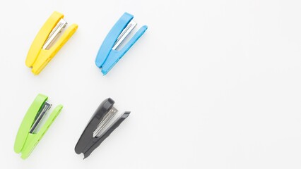 Four colorful ballpoint pens on a white background