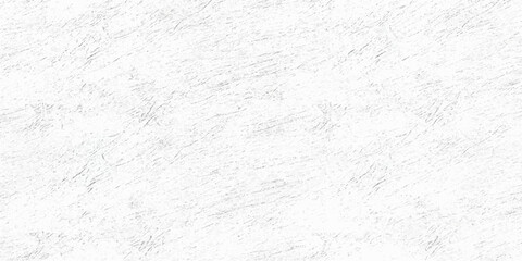 White wall, paper, and marble patterns on a gray, grunge, textured surface perfect for a blank winter backdrop or old stone design