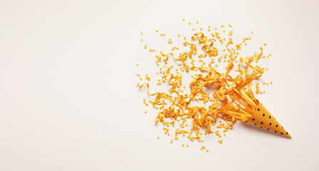Confetti glitter with gold color in vibrant mood for celebration and party concepts.decoration...