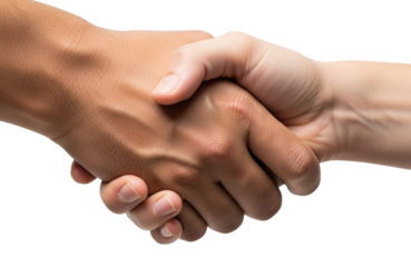 A close-up view of a handshake between two people with different skin tones, symbolizing partnership and cooperation