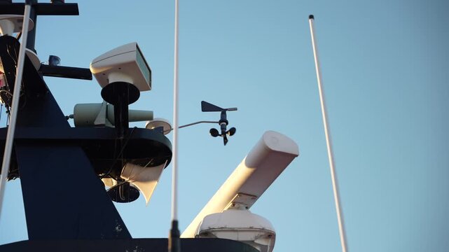Close-up of a small boat anemometer spinning in gentle morning wind