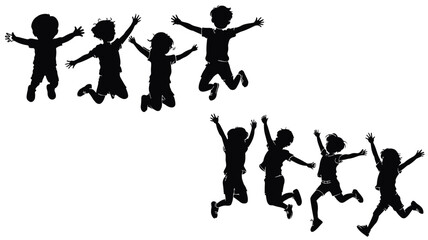 Silhouettes of happy children jumping for joy against a