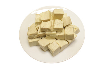 Fresh Tofu Cubes on White Plate Isolated