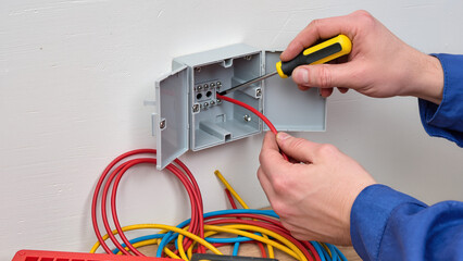 electrician working with electrical wires