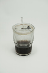 Iced Black Coffee in Glass Cup

Description
Iced black coffee in clear Glass cup isolated on white background, takeaway beverage concept.