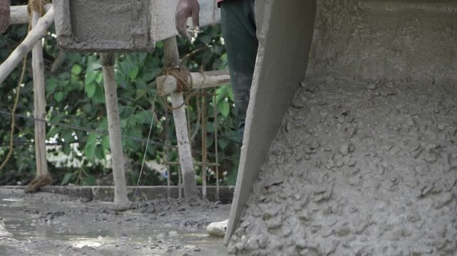 Cement Mixer in Action - Building Construction Site